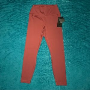 90° leggings in a burgundy color